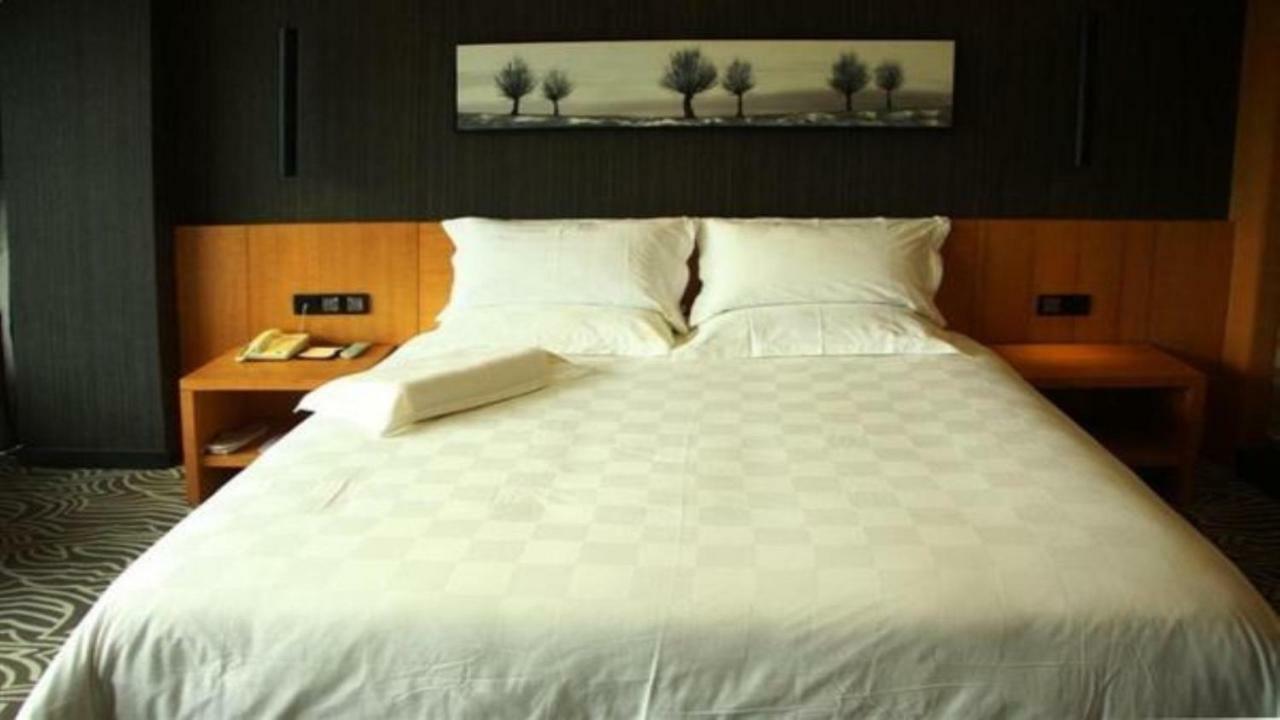 ז'אנגג'יאג'י Friend Hui Hotel מראה חיצוני תמונה