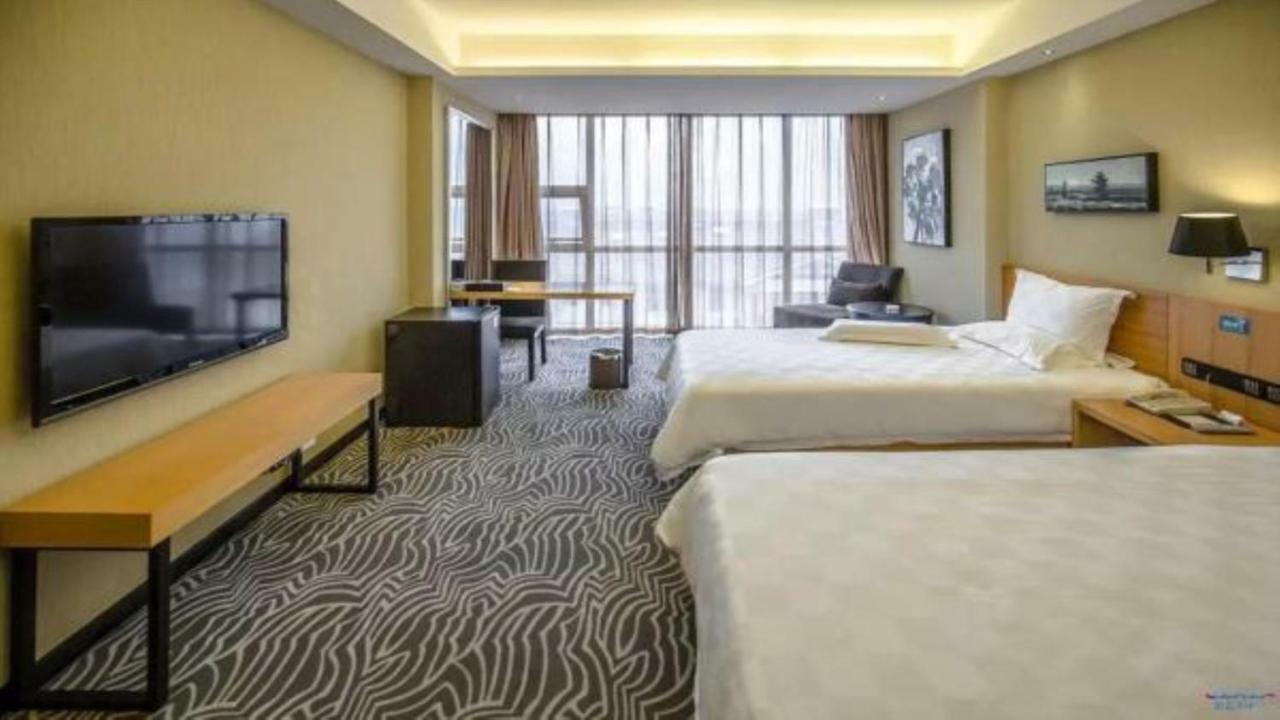 ז'אנגג'יאג'י Friend Hui Hotel מראה חיצוני תמונה